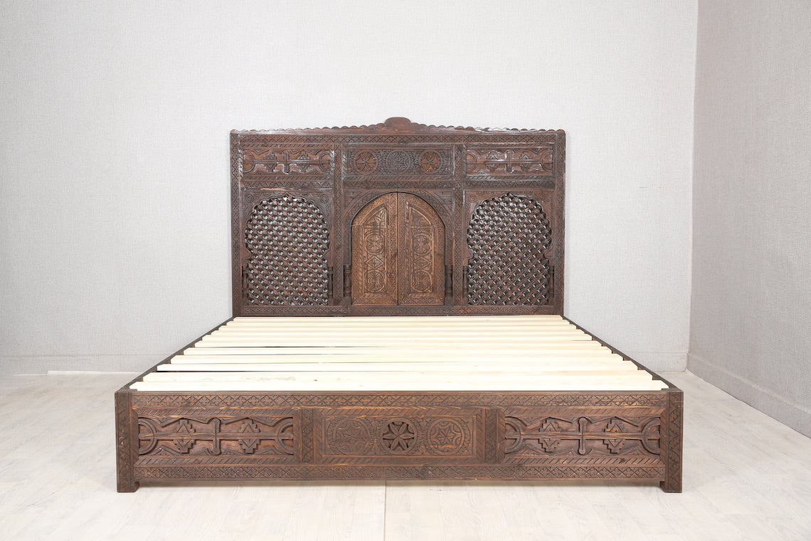 Luxury wooden bed with a unique arched headboard design.