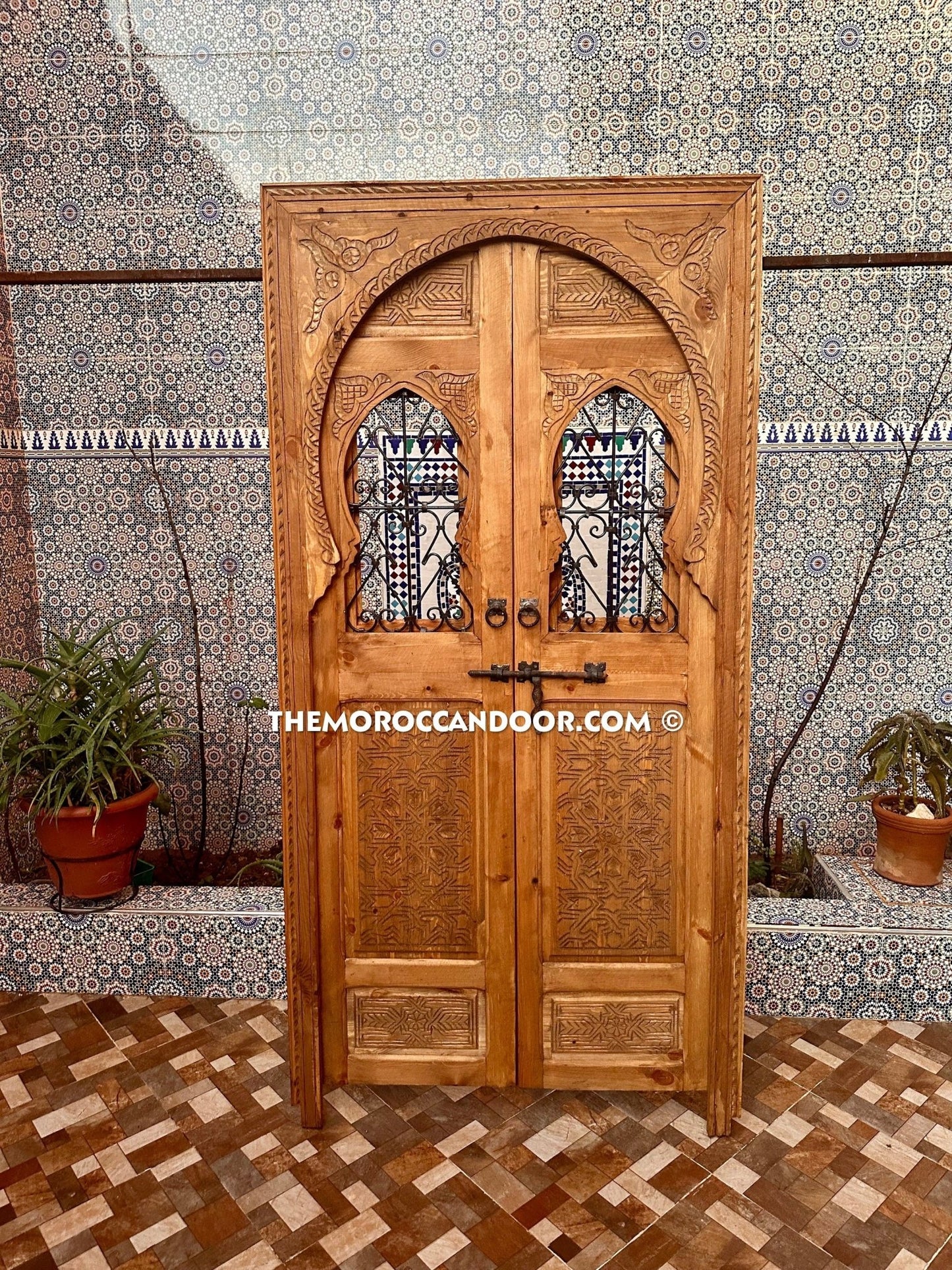 Exquisite Handcrafted Wood Door with Elegant Wrought Iron Windows - Hand-Carved Wood with Wrought Iron Windows.