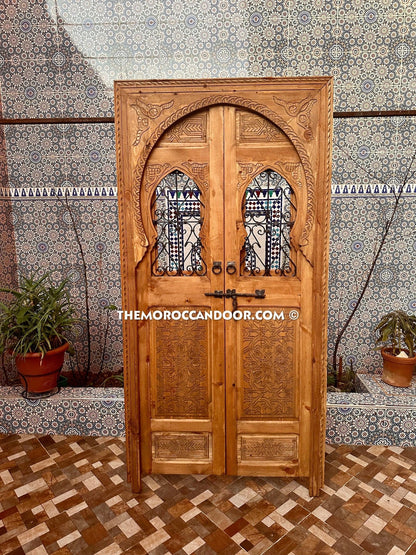 Exquisite Handcrafted Wood Door with Elegant Wrought Iron Windows - Hand-Carved Wood with Wrought Iron Windows.