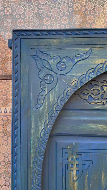 With This Custom Carved Moroccan Blue Door, you can bring the magic of Morocco into your home.